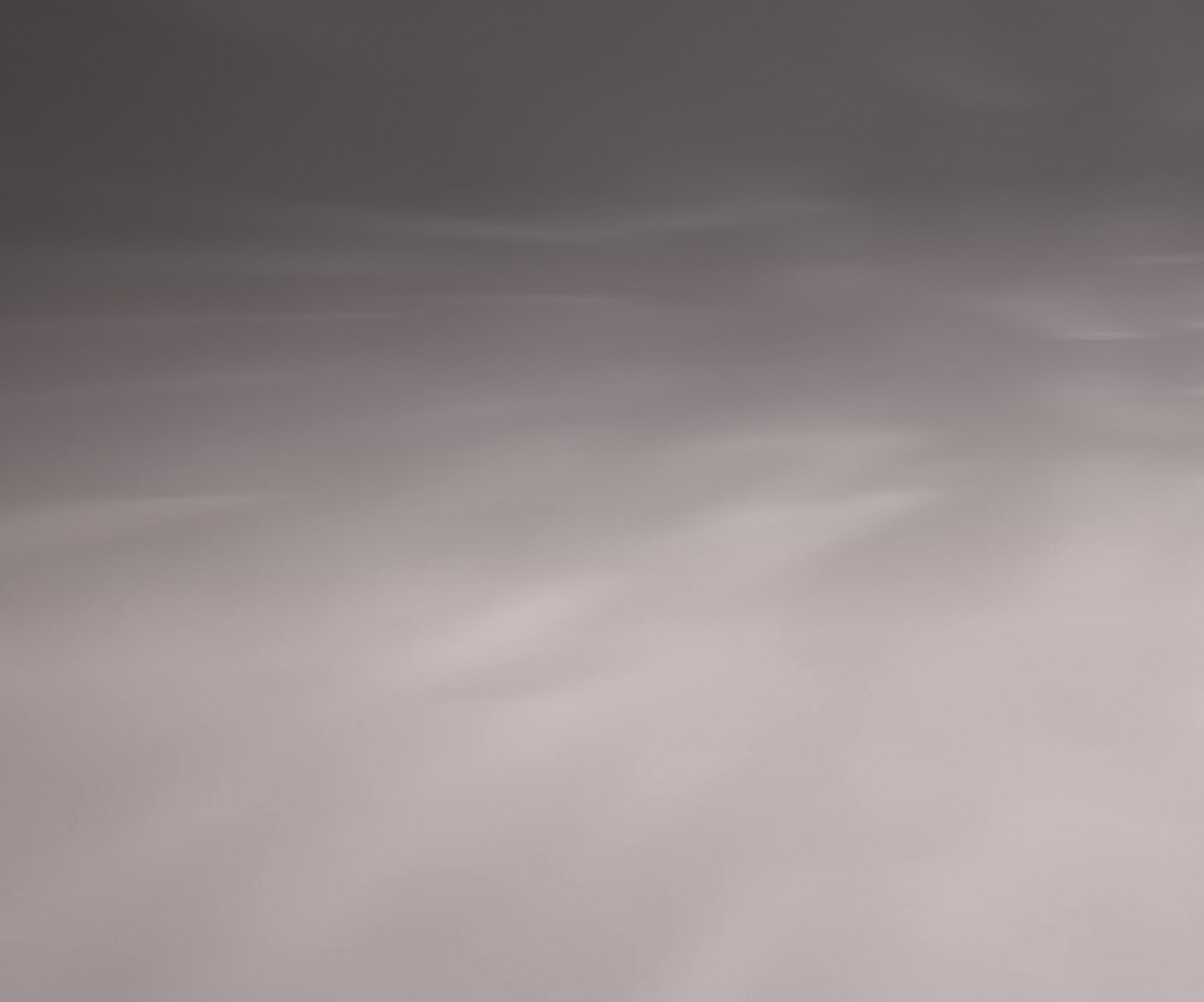 Soft gray abstract texture with smooth gradients.