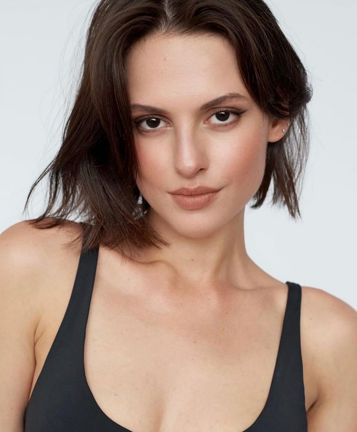 Portrait of woman with natural makeup and hairstyle.