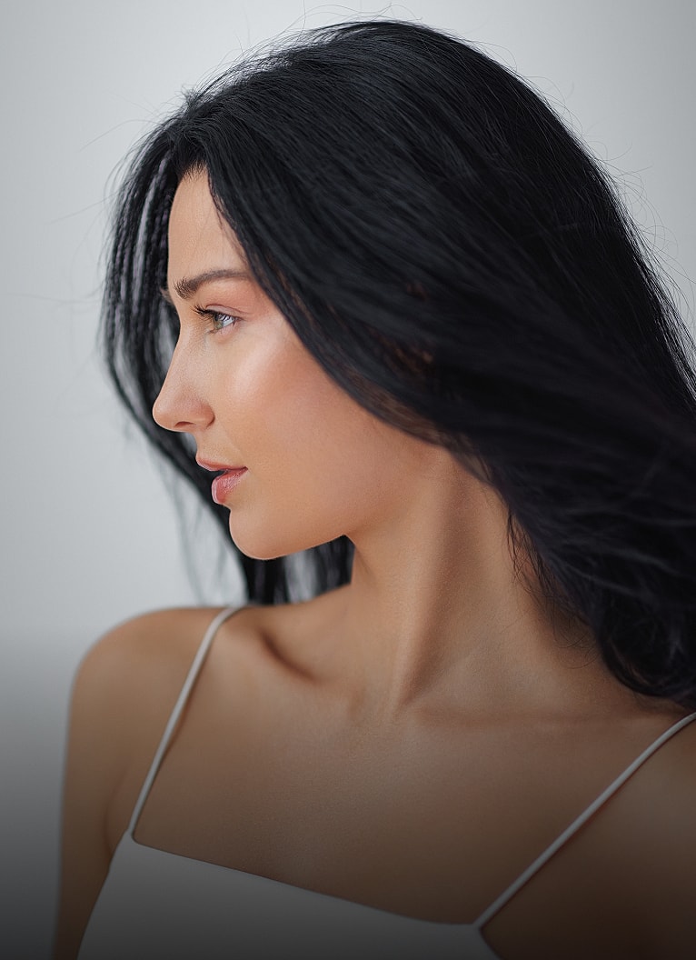 Profile of a woman with long dark hair