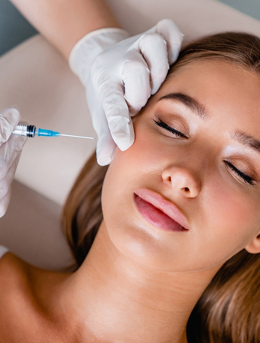 Cosmetic procedure featuring facial injection treatment.
